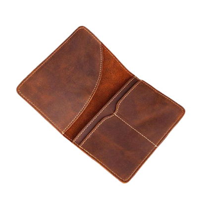 An open brown leather wallet or passport holder with multiple card slots and stitched edges, shown on a plain white background.